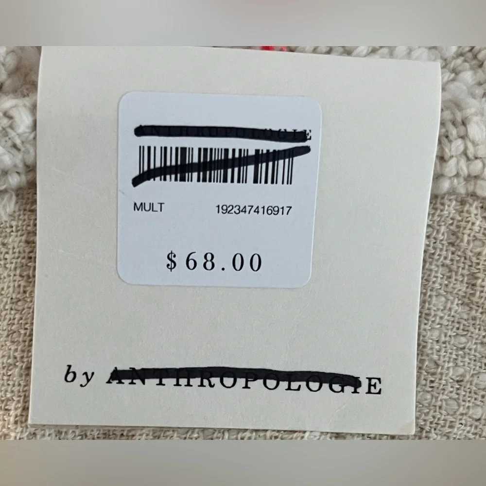 Anthropologie table runner in Cream and Pink/orange Tassel